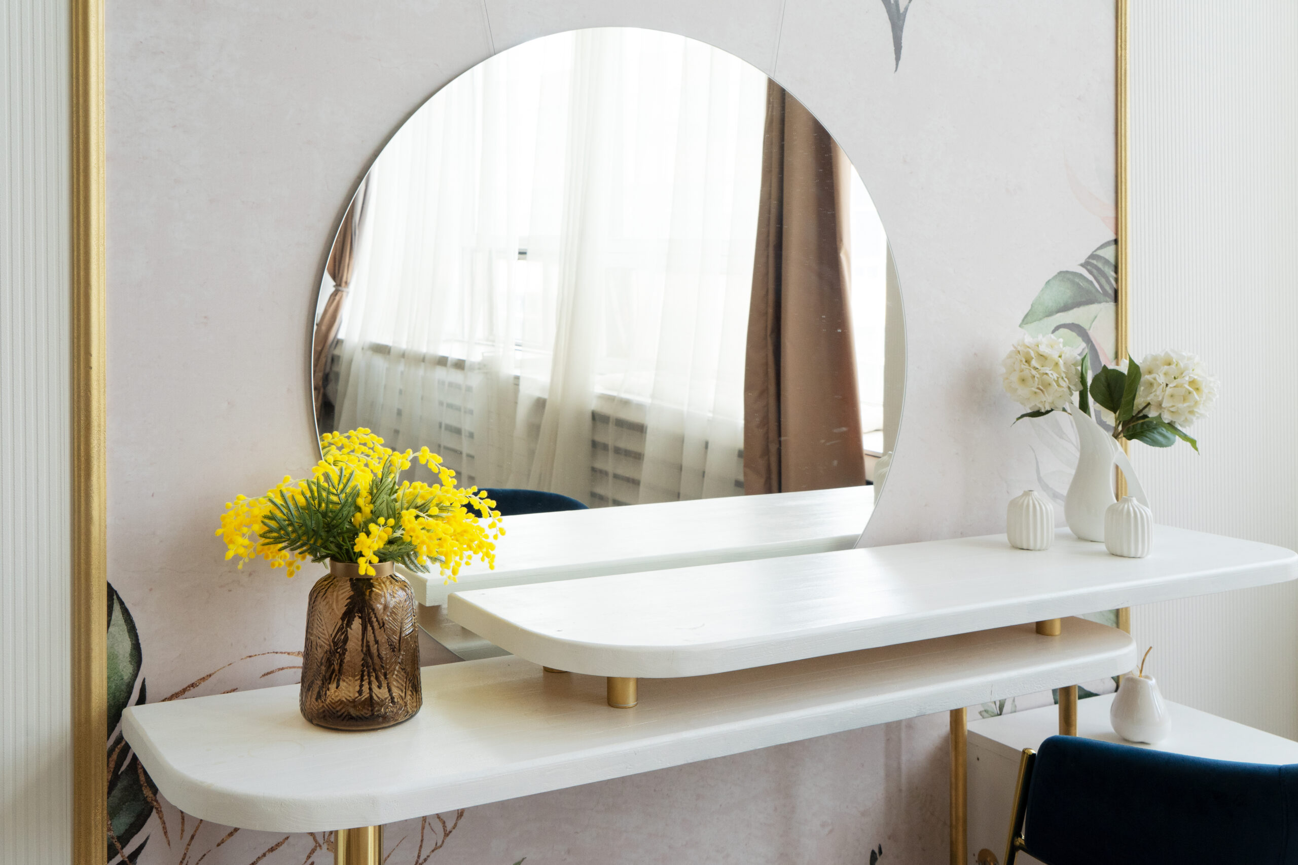 Dressing table with mirror close up in white room
